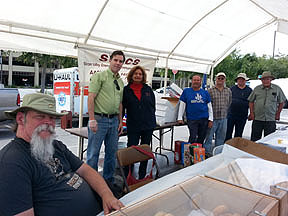 Image showing volunteers at coffee/donut tent at Electronics Flea Market at DeAnza College
